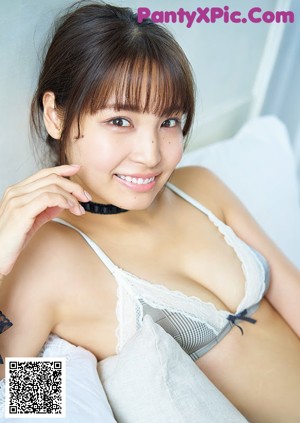 A series of four pictures of a woman in lingerie.