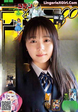 A woman in a school uniform standing next to a bike.